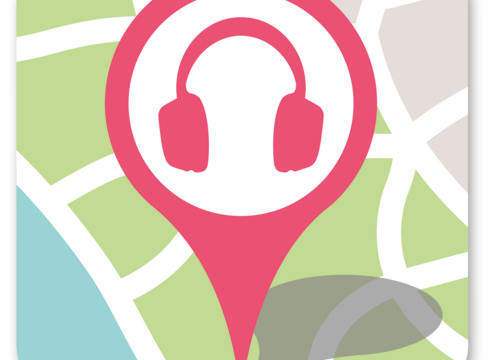 Ein rosa Standortmarker auf einer Karte, der mit einem Kopfhörer-Symbol versehen ist. Der Hintergrund zeigt verschiedene Farben und Linien, die eine stilisierte Karte darstellen. Das Bild vermittelt den Fokus auf Audio- oder Musikangebote an einem bestimmten Ort.